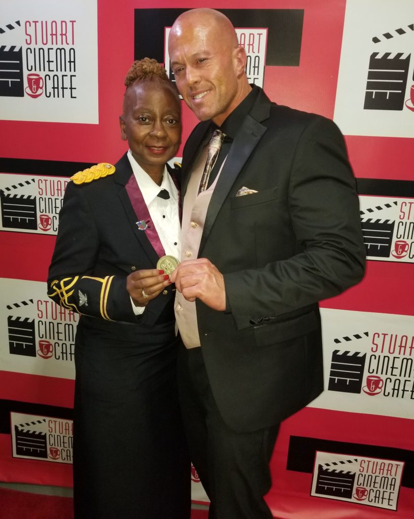 Annette Tucker Osborne & Actor John J. Quinlan 2019 Challenge Coin Award Recipient